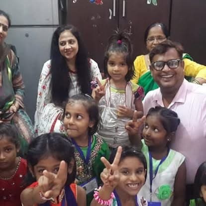 Shubhkarman volunteers visiting children and their caregivers